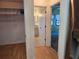 Hallway with access to bathroom, bedroom and pantry at 3130 Prairie Dunes W Cir, Lakeland, FL 33810