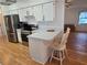 Kitchen with stainless steel appliances and light wood cabinets at 3130 Prairie Dunes W Cir, Lakeland, FL 33810