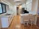 Kitchen with stainless steel appliances and breakfast bar at 3130 Prairie Dunes W Cir, Lakeland, FL 33810