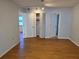 Bedroom with double door closet and wood flooring at 3130 Prairie Dunes W Cir, Lakeland, FL 33810