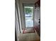 Bright entryway with a storm door and tiled floor at 3130 Prairie Dunes W Cir, Lakeland, FL 33810