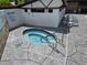 Community hot tub with surrounding patio and lounge chairs at 3130 Prairie Dunes W Cir, Lakeland, FL 33810