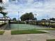 Well-maintained shuffleboard courts with covered seating areas at 3130 Prairie Dunes W Cir, Lakeland, FL 33810