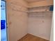 Storage area with wire and wooden shelving units at 3130 Prairie Dunes W Cir, Lakeland, FL 33810