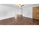 Bright living room with wood-look floors and ceiling fan at 1510 Richmond Rd, Lakeland, FL 33801
