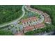 Townhome community with pond and lush surroundings at 8153 Roseville Rd, Davenport, FL 33896