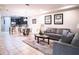 Spacious living area with open kitchen view and seating at 8153 Roseville Rd, Davenport, FL 33896
