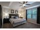 Spacious main bedroom with carpeted floors and king-size bed at 8153 Roseville Rd, Davenport, FL 33896