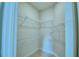 Large walk-in closet with wire shelving for ample storage at 1273 Tagliamento Ln, Haines City, FL 33844