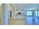 Modern kitchen with island and stainless steel appliances at 1261 Tagliamento Ln, Haines City, FL 33844