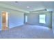 Bright bedroom with access to bathroom and backyard at 1261 Tagliamento Ln, Haines City, FL 33844