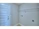 Laundry room with shelving and hookups at 1261 Tagliamento Ln, Haines City, FL 33844