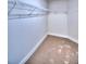 Spacious walk-in closet with wire shelving at 1261 Tagliamento Ln, Haines City, FL 33844