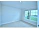 Spacious bedroom with large window and neutral carpet at 1257 Tagliamento Ln, Haines City, FL 33844