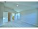 Spacious main bedroom with en-suite bathroom and walk-in closet at 1257 Tagliamento Ln, Haines City, FL 33844