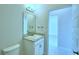 Simple bathroom with single vanity and granite countertop at 1257 Tagliamento Ln, Haines City, FL 33844