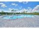 Community pool with pool lift for accessibility at 1257 Tagliamento Ln, Haines City, FL 33844