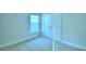 Bedroom with double door closet and carpeted floor at 1257 Tagliamento Ln, Haines City, FL 33844