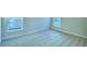 Cozy bedroom with neutral carpeting and large windows at 502 Tanaro Ln, Haines City, FL 33844