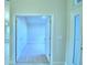 Open hallway with doors leading to additional rooms at 502 Tanaro Ln, Haines City, FL 33844
