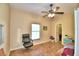 Charming bedroom with ceiling fan and large window at 1955 W Lake Hamilton Dr, Winter Haven, FL 33881