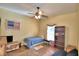 Small bedroom with twin bed and bookcase at 1955 W Lake Hamilton Dr, Winter Haven, FL 33881