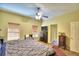 Large main bedroom with king bed and dresser at 1955 W Lake Hamilton Dr, Winter Haven, FL 33881