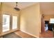 Bright entryway with tile floors and view to living room at 1955 W Lake Hamilton Dr, Winter Haven, FL 33881