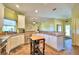 Kitchen with an island and stainless steel appliances at 1955 W Lake Hamilton Dr, Winter Haven, FL 33881