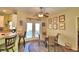 Kitchen breakfast nook with glass table and chairs at 1955 W Lake Hamilton Dr, Winter Haven, FL 33881