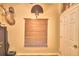 Home office with wood blinds and mounted decor at 1955 W Lake Hamilton Dr, Winter Haven, FL 33881