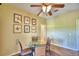 Eat-in kitchen nook with glass table and chairs at 1955 W Lake Hamilton Dr, Winter Haven, FL 33881