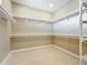 Bright walk-in closet with ample shelving and hanging space at 1793 Lakehill Dr, Winter Haven, FL 33884
