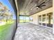 Covered patio with pavers, screens, and wood ceiling at 1793 Lakehill Dr, Winter Haven, FL 33884