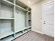 Built-in shelves and bench create a convenient drop zone at 1793 Lakehill Dr, Winter Haven, FL 33884