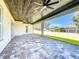 Relaxing screened patio with paver tile floor and wood ceiling at 1793 Lakehill Dr, Winter Haven, FL 33884