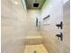 Large walk-in shower with rainfall shower head and bench at 1793 Lakehill Dr, Winter Haven, FL 33884