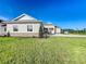 Craftsman style home with stone accents and a three-car garage at 1793 Lakehill Dr, Winter Haven, FL 33884