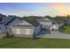 Single-Gathering home with a large paved driveway and landscaped lawn at 1793 Lakehill Dr, Winter Haven, FL 33884
