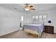 Bedroom with an antique bed and a ceiling fan at 1441 S Lake Roy Dr, Winter Haven, FL 33884
