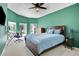 Spacious bedroom with a large bed and built-in desk area at 1441 S Lake Roy Dr, Winter Haven, FL 33884