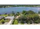 Wide shot of lakefront neighborhood, showing homes and lake at 1441 S Lake Roy Dr, Winter Haven, FL 33884