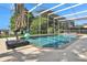 Inviting screened pool with lake view at 1441 S Lake Roy Dr, Winter Haven, FL 33884