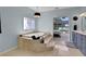 Bathroom features a large soaking tub, double vanity, and water view at 1441 S Lake Roy Dr, Winter Haven, FL 33884