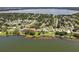 Wide shot of lakefront neighborhood, showing homes and lake at 1441 S Lake Roy Dr, Winter Haven, FL 33884