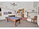 Game room with a pool table and wet bar at 1441 S Lake Roy Dr, Winter Haven, FL 33884