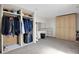 Spacious walk-in closet with custom built-ins and window at 1441 S Lake Roy Dr, Winter Haven, FL 33884