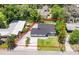 Aerial view of house, yard, and driveway at 1004 Avenue G Ne, Winter Haven, FL 33881