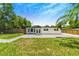 House exterior with gray stone accents and landscaping at 1004 Avenue G Ne, Winter Haven, FL 33881