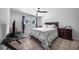 Bright bedroom with a queen-size bed and ample closet space at 1004 Avenue G Ne, Winter Haven, FL 33881